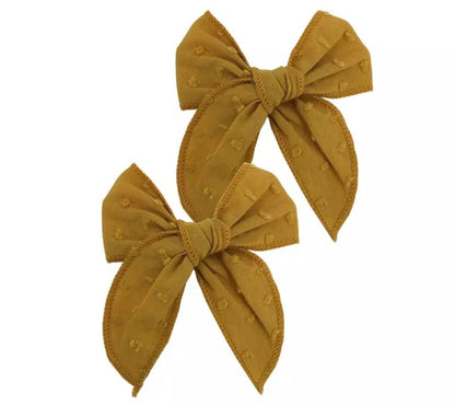 Moños en par Madeleine